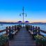 Carnelian Bay, Califronia USA - July 18, 2015: Scenic view onto Lake Tahoe at sunset from an old wooden pier at the Gar Woods Lake Tahoe restaurant